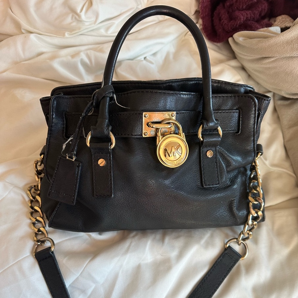 Michael Kors Black lock bag. Gently used